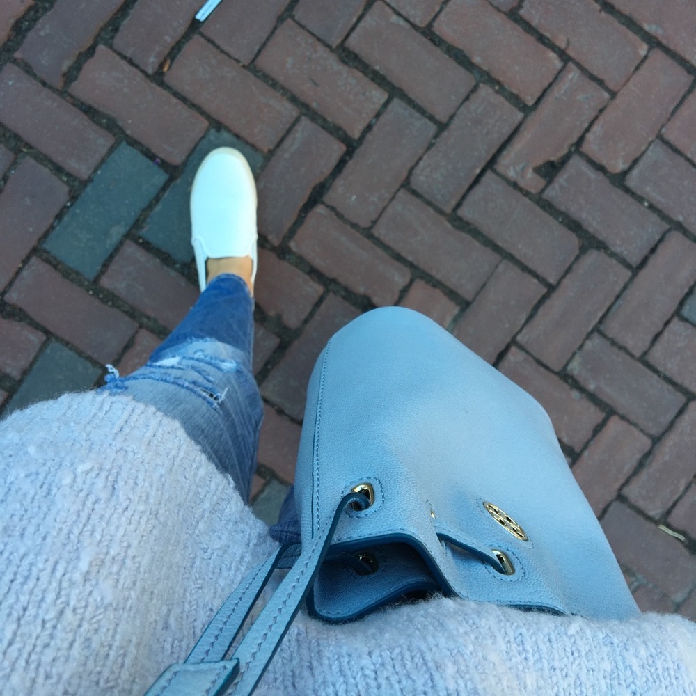 Light blue Tory Burch mini bucket bag.